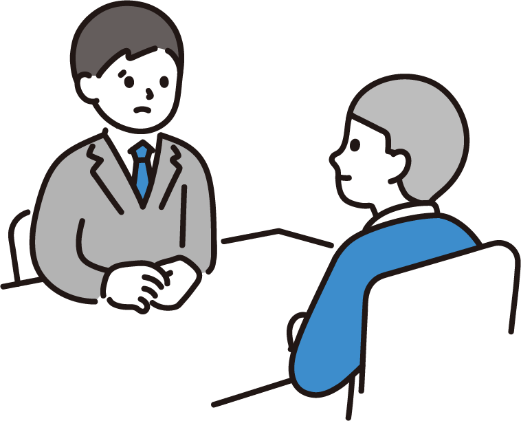 商談や相談の場面で向き合って話をするスーツ姿の男性ふたり